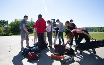 Summer Academy Film School students preparing for a shoot