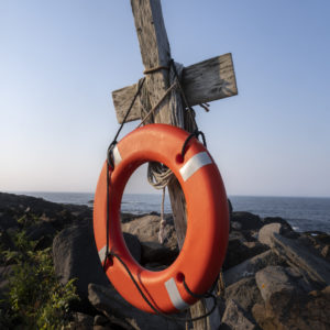 Monhegan Island, Life buoy hung around a wooden cross.