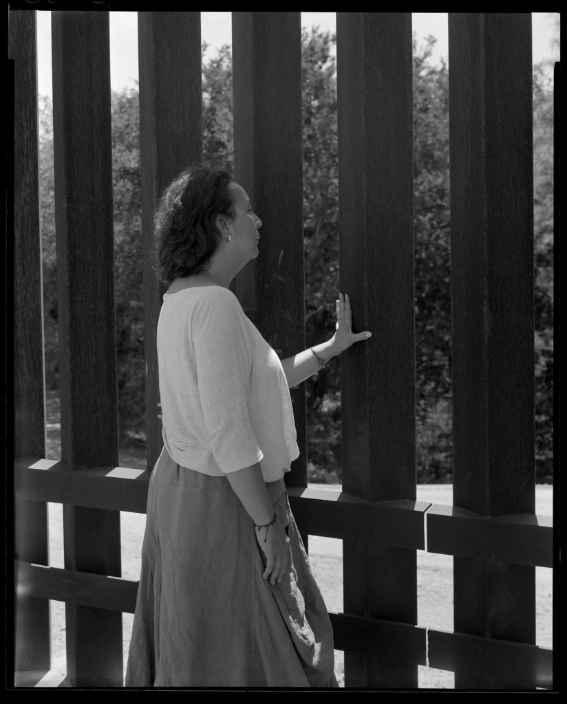 Carmen, a volunteer at the Catholic Charities of the Rio Grande Valley, sees the border wall for the first time.