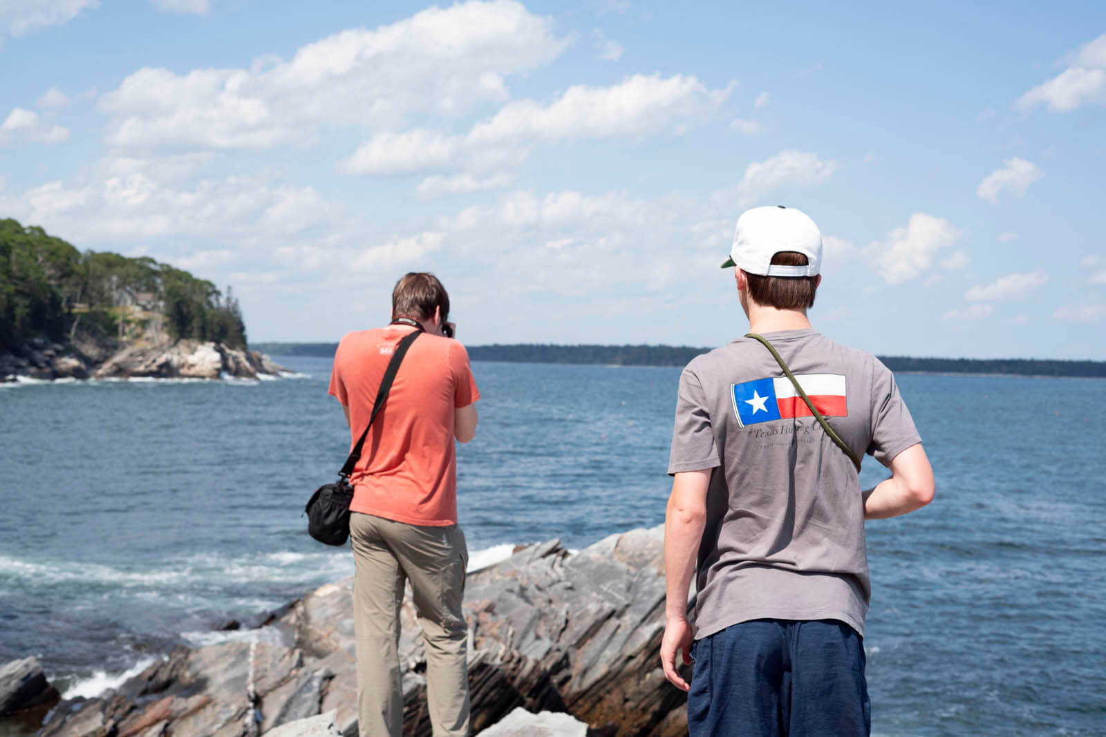 Young Artists Academy students photographing the ocean along the Maine coastline