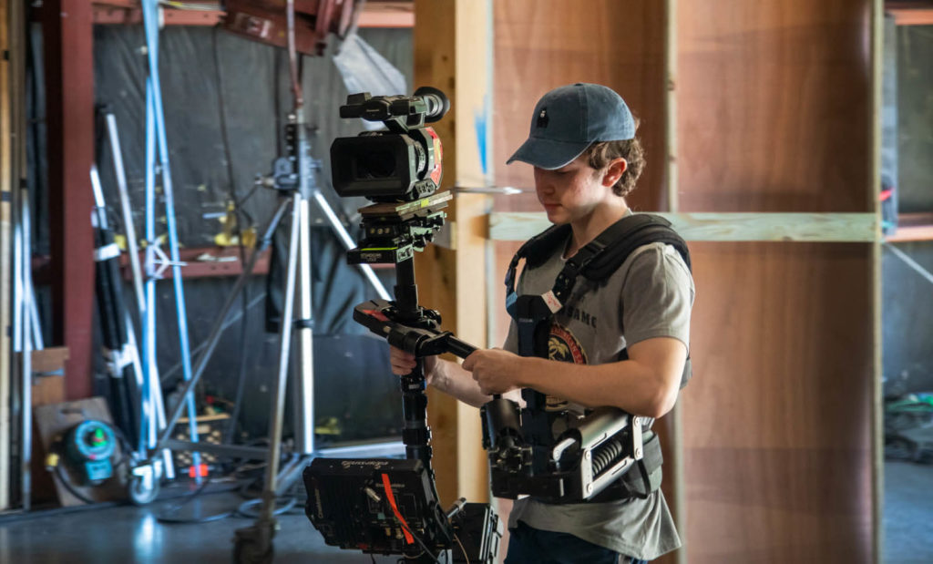 Student wearing a Steadicam