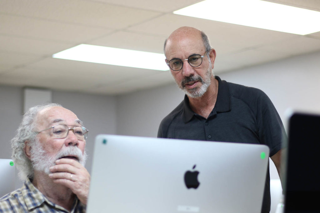 Terry Abrams coaching a student in his Digital Photography II workshop