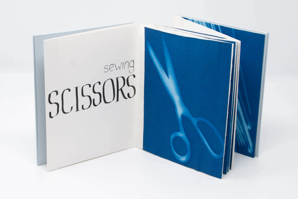 Scissors, cyanotype book By Solange Kellermann.